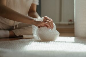 How to pack and protect your delicate items for a move and not use bubble wrap? Here are alternative (and budget) ways to do so.